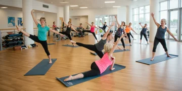 Diverse people enjoying low-impact fitness activities in a modern gym setting, emphasizing wellness and accessibility.